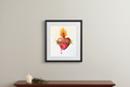 Sacred Heart of Jesus original watercolor displayed in a thin black frame with white mat